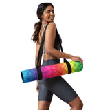 Lightweight geometric rainbow yoga mat rolled for easy transport