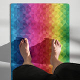 Premium geometric rainbow yoga mat designed for studio yoga sessions