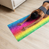 Geometric rainbow yoga mat used for yoga and stretching workouts
