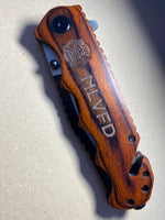 Laser engraved NLVFD locking knife