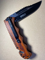 Laser engraved NLVFD locking knife