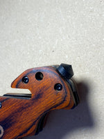 Laser engraved NLVFD locking knife