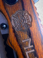 Laser engraved NLVFD locking knife
